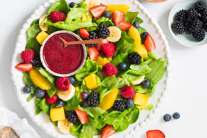 Salad of green leaves with berries